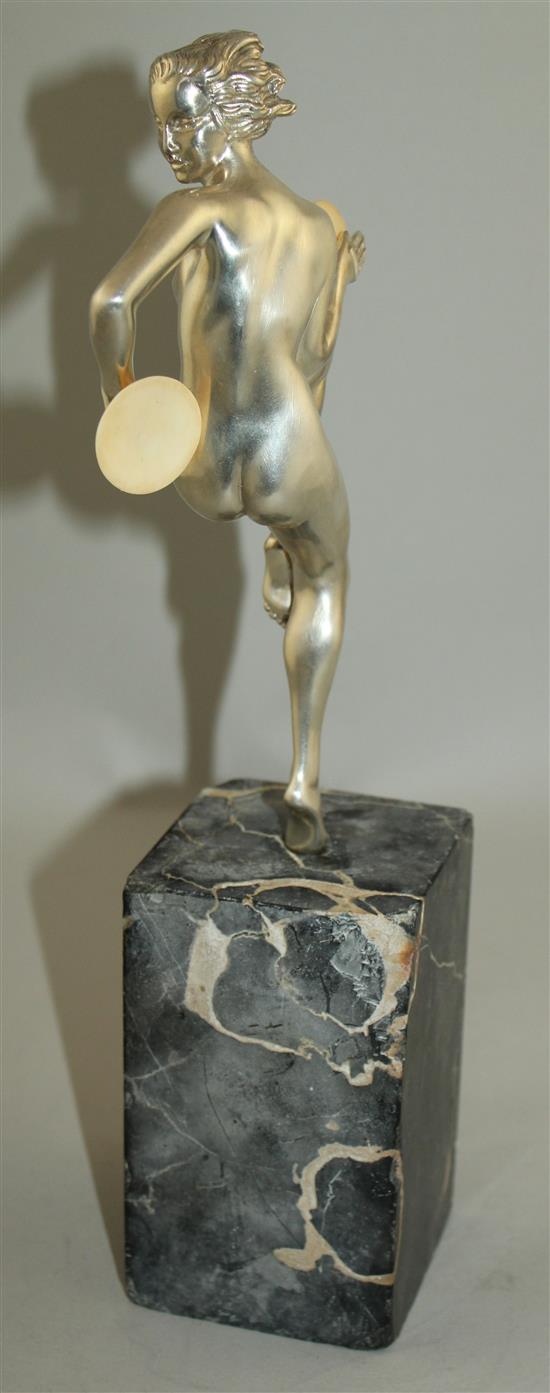 An Art Deco silvered bronze figure of a nude female dancer, overall 12.5in.